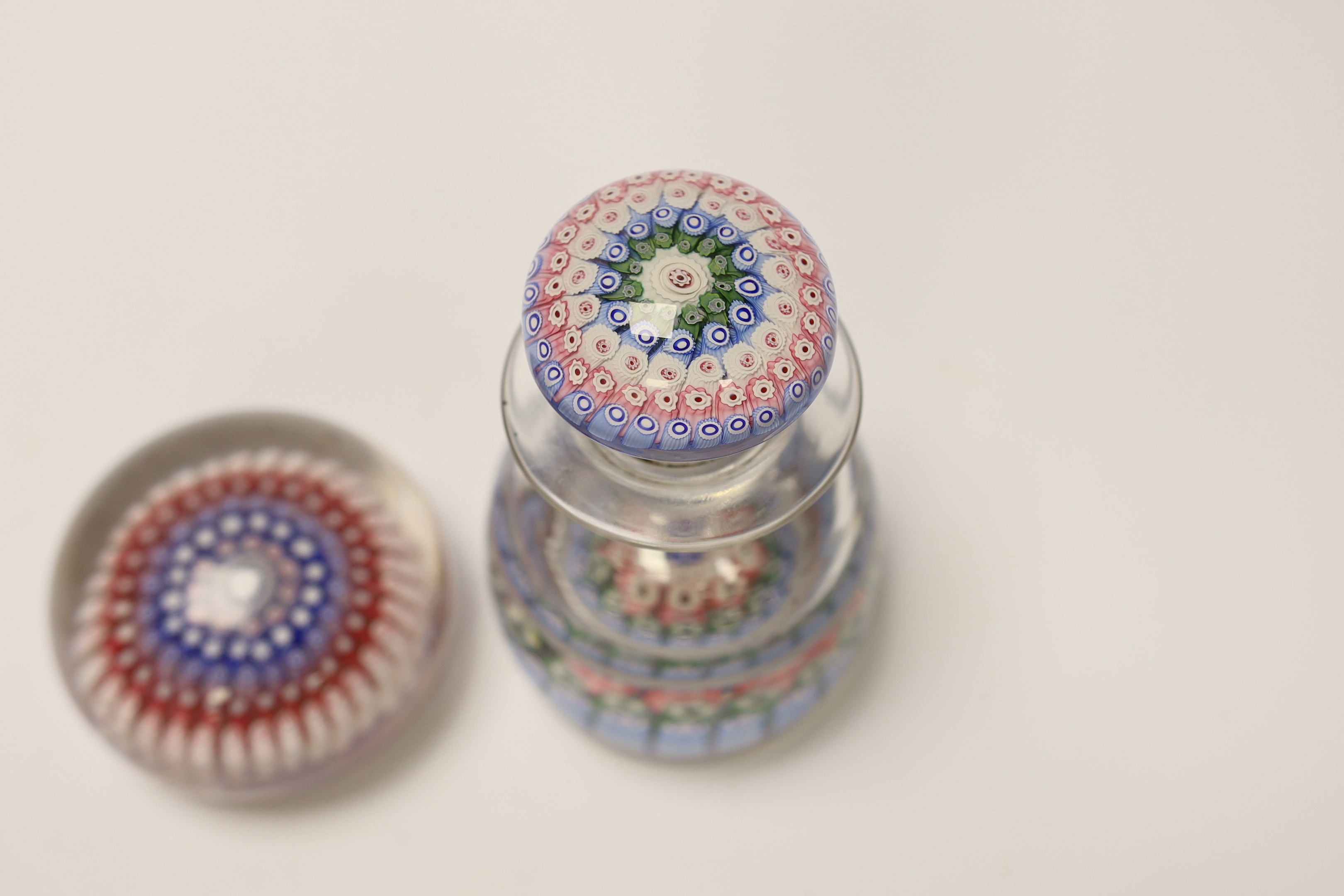 A millefiori glass inkwell and a paperweight, 14cm high